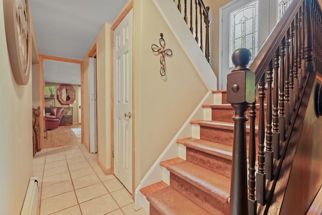 39 Bykenhulle Rd, Hopewell Junction, NY 12533 - stairs featuring a baseboard heating unit and tile patterned floors