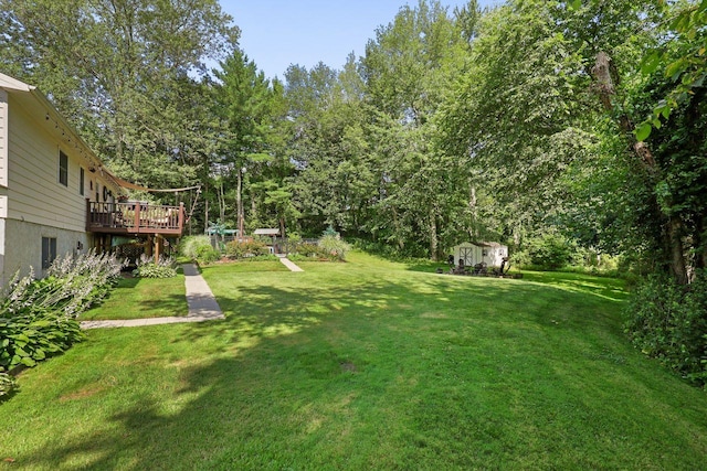 39 Bykenhulle Rd, Hopewell Junction, NY 12533 - view of grassy yard featuring a storage shed and a wooden deck