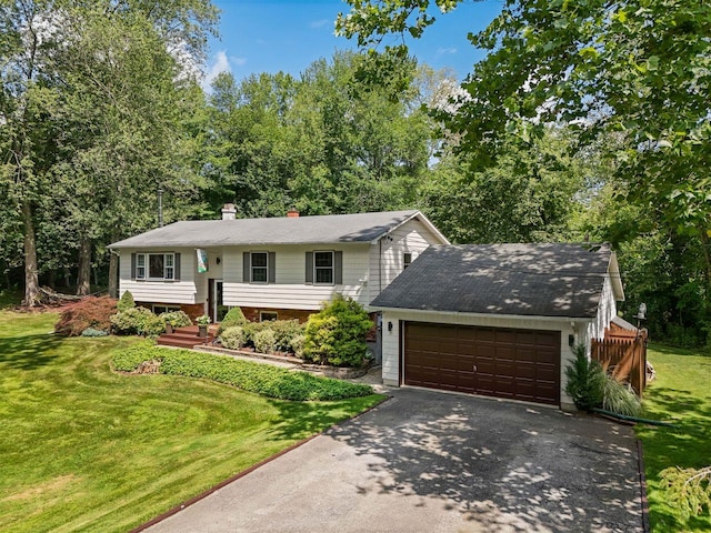 39 Bykenhulle Rd, Hopewell Junction, NY 12533 - split foyer home featuring a chimney, driveway, a front lawn, and an attached garage