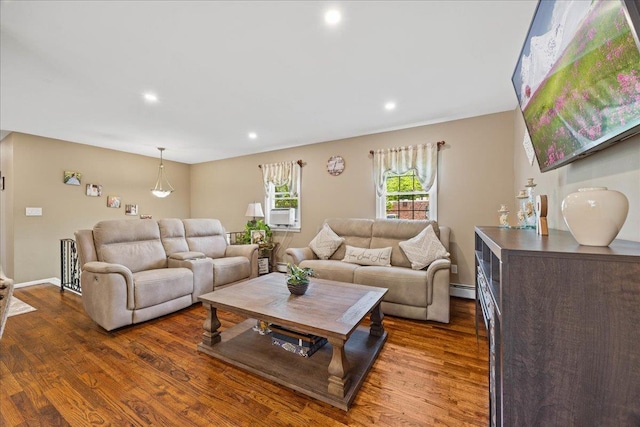 273 N Brewster Rd, Brewster, NY 10509 - living area with dark wood-style floors, a baseboard radiator, and recessed lighting