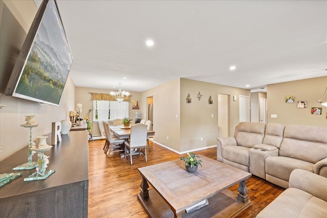 273 N Brewster Rd, Brewster, NY 10509 - living room with a chandelier, light wood-style flooring, and recessed lighting