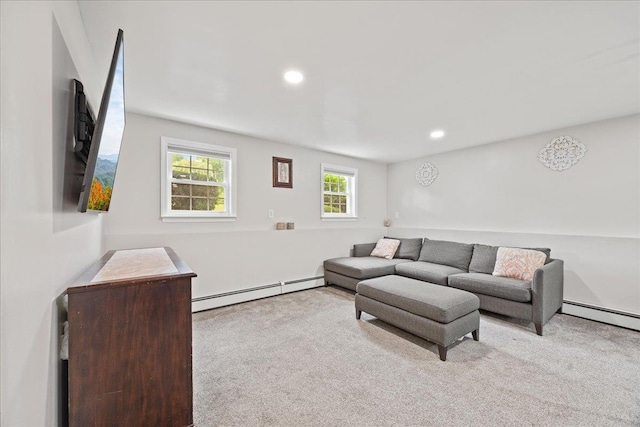 273 N Brewster Rd, Brewster, NY 10509 - carpeted living room featuring a baseboard radiator and recessed lighting