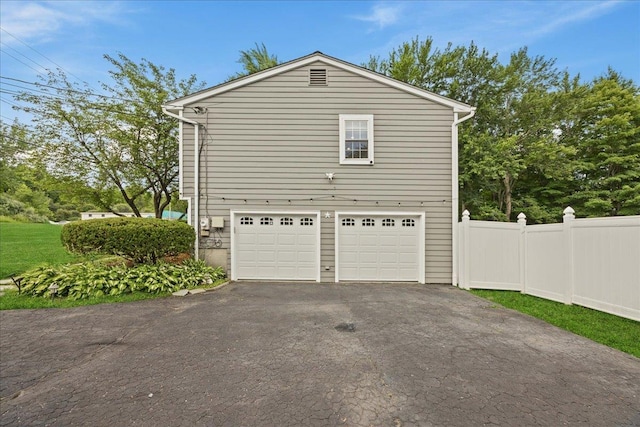 273 N Brewster Rd, Brewster, NY 10509 - view of property exterior with driveway and a garage
