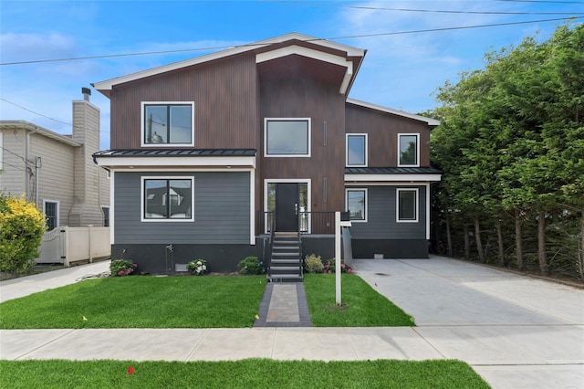 141 Flamingo St, Atlantic Beach, NY 11509 - contemporary home featuring a standing seam roof and a metal roof