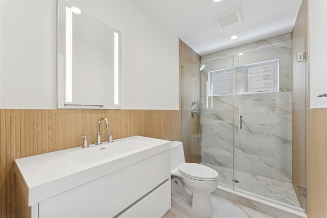 141 Flamingo St, Atlantic Beach, NY 11509 - full bath with a marble finish shower, wainscoting, vanity, and recessed lighting