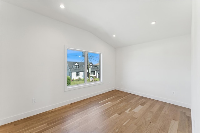 141 Flamingo St, Atlantic Beach, NY 11509 - empty room with light wood-type flooring, lofted ceiling, and recessed lighting