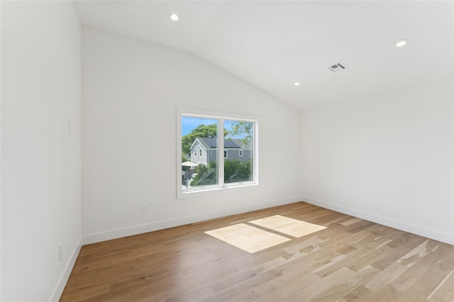 141 Flamingo St, Atlantic Beach, NY 11509 - spare room with vaulted ceiling, light wood-type flooring, and recessed lighting