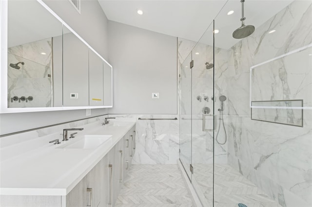 141 Flamingo St, Atlantic Beach, NY 11509 - full bath with a marble finish shower, double vanity, and recessed lighting