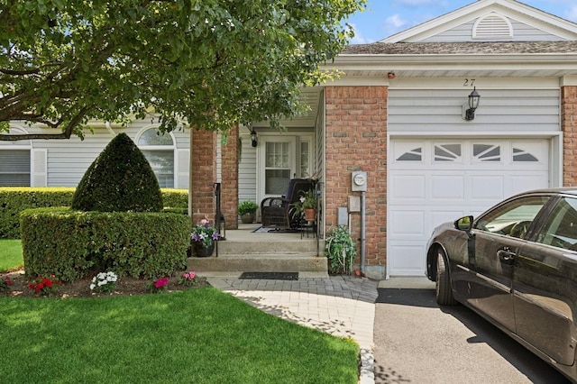 27 Primrose Ln, North Babylon, NY 11703 - view of front facade featuring a garage, brick siding, a front lawn, and covered porch