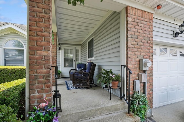 27 Primrose Ln, North Babylon, NY 11703 - view of patio / terrace with a garage
