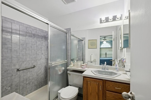 27 Primrose Ln, North Babylon, NY 11703 - full bath featuring vanity, a shower stall, and a ceiling fan