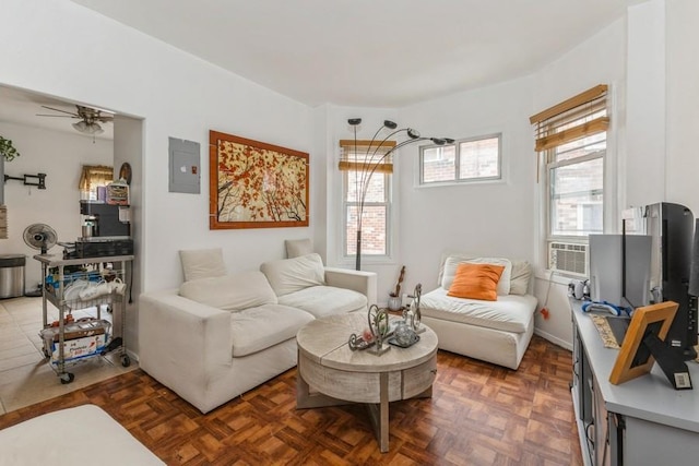 4808 92nd St, Elmhurst, NY 11373 - living room with plenty of natural light, a ceiling fan, electric panel, and cooling unit