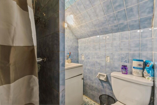 4808 92nd St, Elmhurst, NY 11373 - full bath with tile walls, vanity, and curtained shower