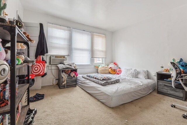 4808 92nd St, Elmhurst, NY 11373 - bedroom with carpet flooring and cooling unit