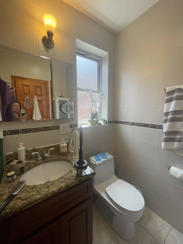 20-39 150th St, Whitestone, NY 11357 - half bathroom featuring vanity, tile walls, and tile patterned flooring
