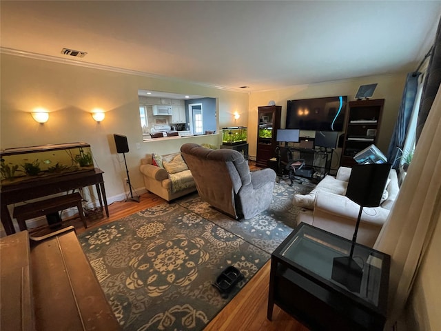 39 Herbert Ave, Lindenhurst, NY 11757 - living room with wood finished floors and crown molding