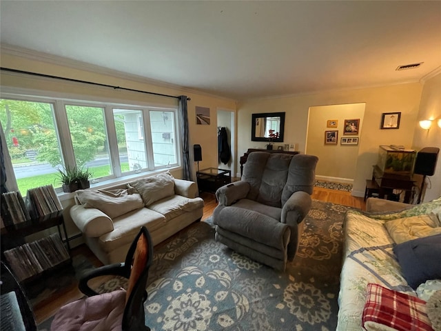39 Herbert Ave, Lindenhurst, NY 11757 - living area featuring ornamental molding, wood finished floors, and baseboard heating