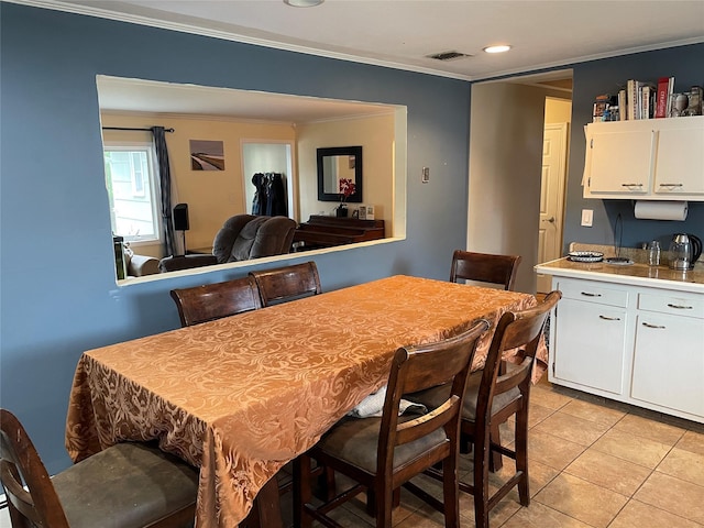 39 Herbert Ave, Lindenhurst, NY 11757 - dining room with ornamental molding, light tile patterned floors, and recessed lighting