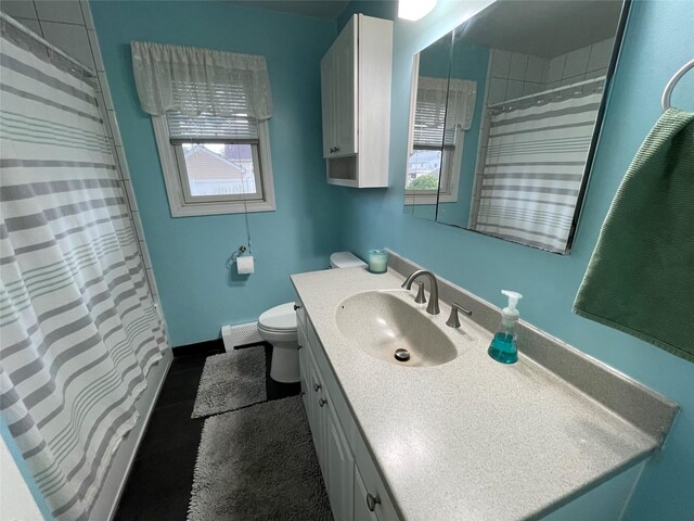 39 Herbert Ave, Lindenhurst, NY 11757 - full bath with vanity, curtained shower, and a baseboard heating unit