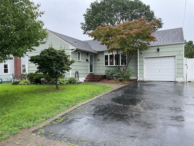 39 Herbert Ave, Lindenhurst, NY 11757 - single story home featuring a garage, driveway, and a shingled roof