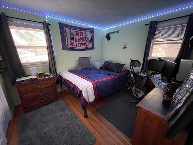 39 Herbert Ave, Lindenhurst, NY 11757 - bedroom with wood finished floors and an office area