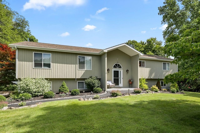 9 Carol Ct, Brewster, NY 10509 - split foyer home with a front yard and a shingled roof