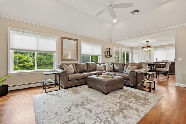 9 Carol Ct, Brewster, NY 10509 - living room with a ceiling fan, a baseboard radiator, wood finished floors, a chandelier, and lofted ceiling
