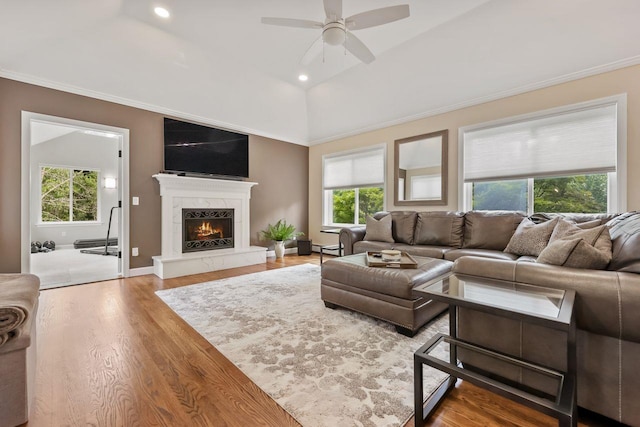 9 Carol Ct, Brewster, NY 10509 - living area with ceiling fan, lofted ceiling, a fireplace, wood finished floors, and recessed lighting