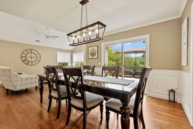 9 Carol Ct, Brewster, NY 10509 - dining room featuring wood finished floors, a wainscoted wall, ceiling fan, crown molding, and a decorative wall