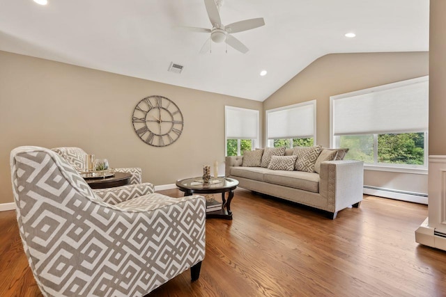 9 Carol Ct, Brewster, NY 10509 - living area with baseboard heating, vaulted ceiling, wood finished floors, a ceiling fan, and recessed lighting