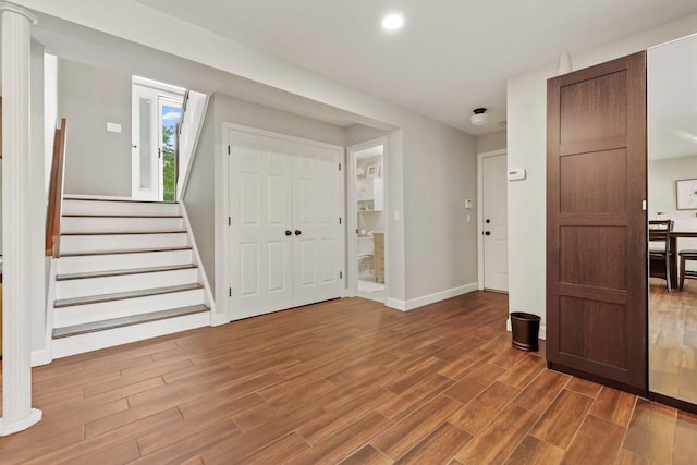 9 Carol Ct, Brewster, NY 10509 - foyer featuring wood finished floors, stairs, and recessed lighting