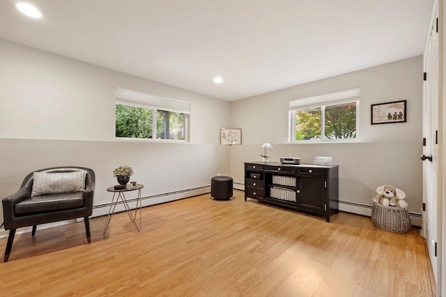 9 Carol Ct, Brewster, NY 10509 - sitting room featuring light wood finished floors, a baseboard heating unit, and recessed lighting