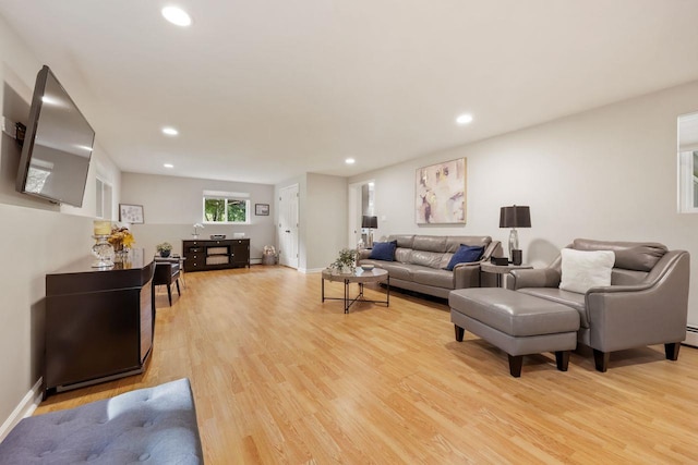9 Carol Ct, Brewster, NY 10509 - living area featuring light wood-style flooring and recessed lighting