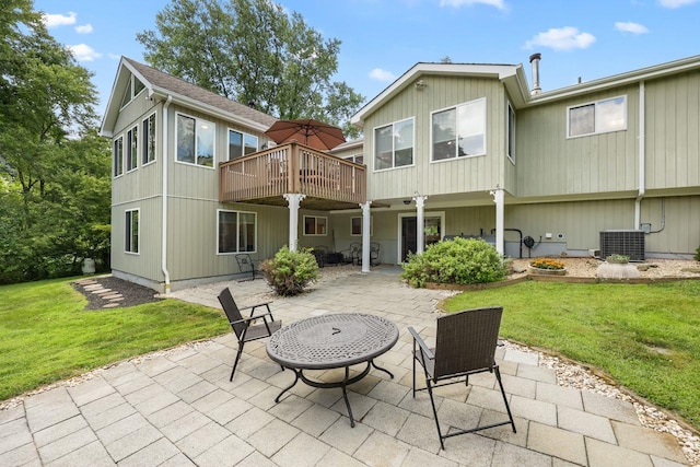 9 Carol Ct, Brewster, NY 10509 - rear view of property with a lawn, a patio area, and a deck