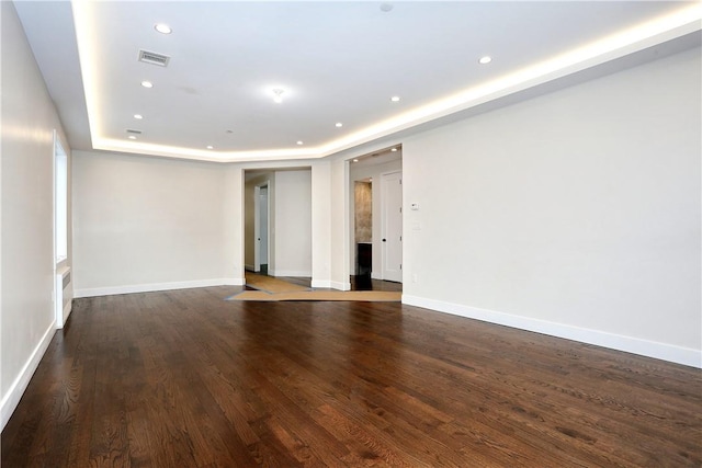 33 Ewing Ave Unit 102, Spring Valley, NY 10977 - spare room featuring a raised ceiling, recessed lighting, and wood finished floors