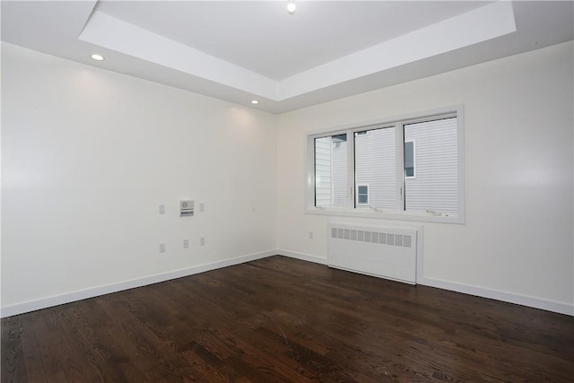 33 Ewing Ave Unit 102, Spring Valley, NY 10977 - unfurnished room with radiator heating unit, a tray ceiling, wood finished floors, and recessed lighting