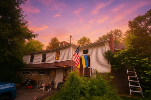 2 Couzines Rd, Woodbourne, NY 12788 - back of property at dusk with a chimney