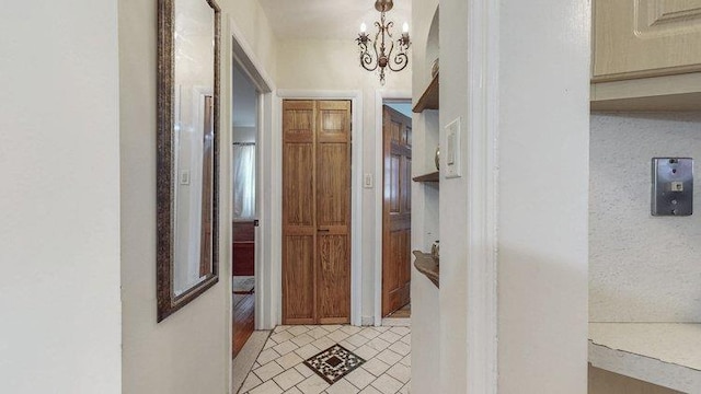 46-03 195th St, Flushing, NY 11358 - corridor featuring a chandelier and tile patterned floors