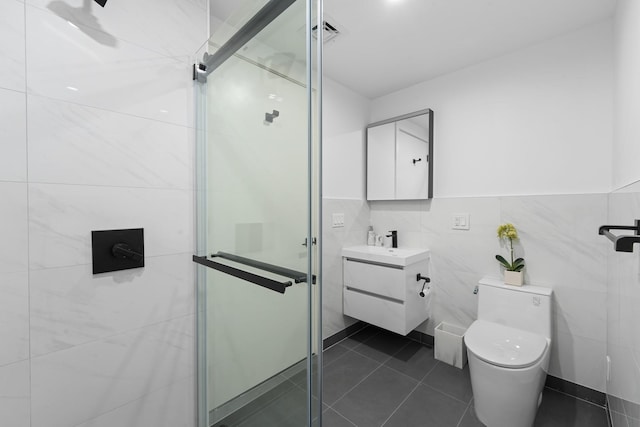 46-40 Vernon Blvd Unit 2A, Long Island City, NY 11101 - full bath featuring vanity, tile walls, a shower stall, pet washing station, and tile patterned floors