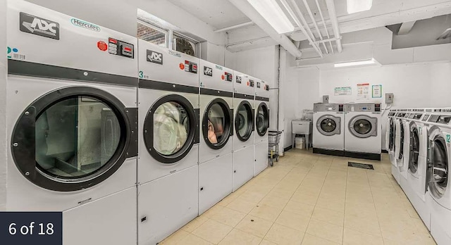 14330 Roosevelt Unit 5J, Flushing, NY 11354 - shared laundry room featuring washer and dryer and light tile patterned floors