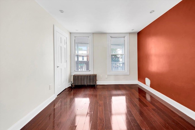 1519 Rosedale Ave, Bronx, NY 10460 - spare room with radiator and hardwood / wood-style flooring