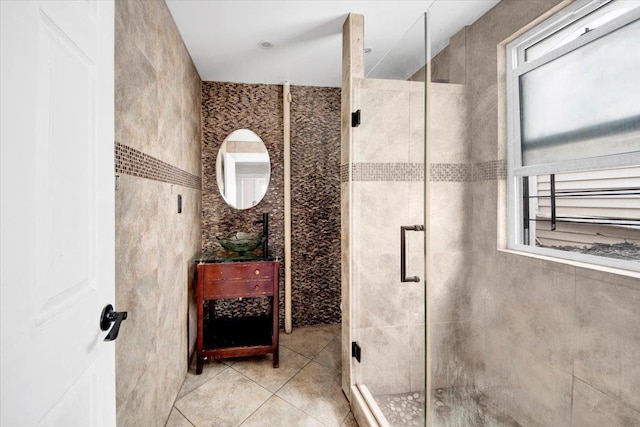 1519 Rosedale Ave, Bronx, NY 10460 - full bathroom featuring tile walls, vanity, a shower stall, and tile patterned floors