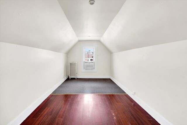 1519 Rosedale Ave, Bronx, NY 10460 - bonus room with lofted ceiling, radiator heating unit, and hardwood / wood-style floors