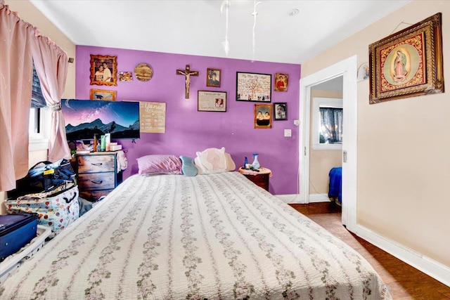 1519 Rosedale Ave, Bronx, NY 10460 - bedroom with baseboards and wood finished floors