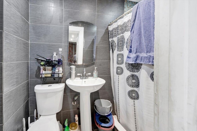 1519 Rosedale Ave, Bronx, NY 10460 - bathroom with tile walls and curtained shower