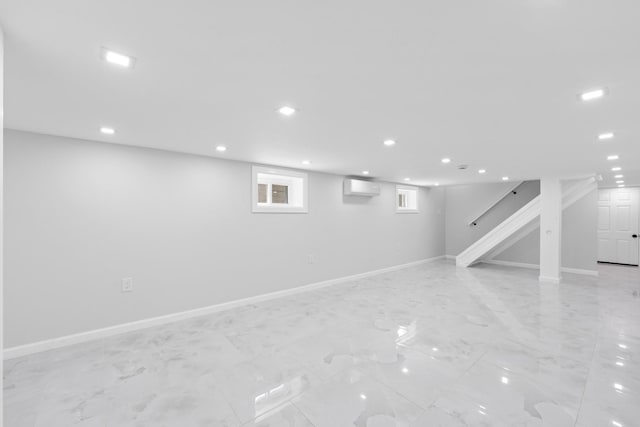 1276 E 59th St, Brooklyn, NY 11234 - basement featuring a wall mounted air conditioner, stairs, recessed lighting, and light marble finish floors