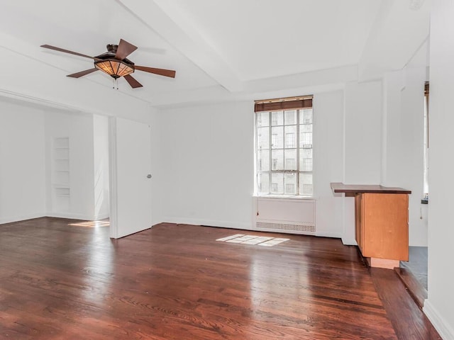 340 W 57th St Unit 5F, New York Manhattan, NY 10019 - unfurnished living room with wood finished floors, ceiling fan, and beamed ceiling