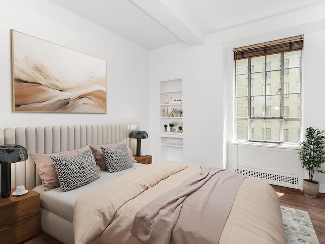 340 W 57th St Unit 5F, New York Manhattan, NY 10019 - bedroom featuring wood finished floors and beamed ceiling