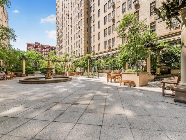 340 W 57th St Unit 5F, New York Manhattan, NY 10019 - view of community with a patio area