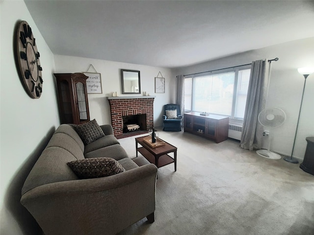 52 Fountain Pl, Poughkeepsie, NY 12603 - living room featuring radiator heating unit, light carpet, and a fireplace